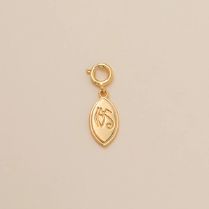 Bohemian gold plated oval pendant charm with engraved totem and spring clasp detail