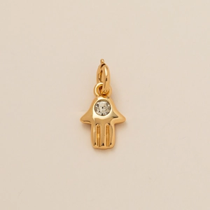 Golden Hamsa Hand pendant featuring a polished finish and a central sparkling zircon stone