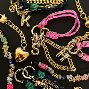Luxury alphabet bag charms with gold cuban chain and colorful woven rope pendants