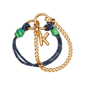 Detail of colorful woven rope bracelet with gold metal chain and letter K charm