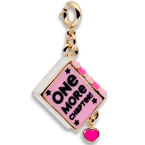 Enamel book charm with 'One More Chapter' text and pink heart pendant on gold base