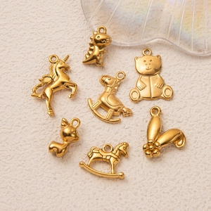 Golden 18K plated stainless steel animal pendants including dinosaur, unicorn and teddy bear