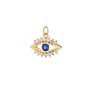 Macro shot of 18K gold plated evil eye pendant with blue gem and white crystals