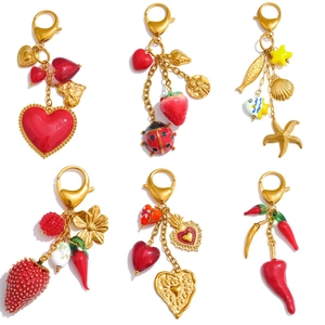 Colorful summer heart strawberry keychain collection in gold plated metal for handbags