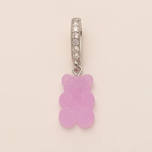 Detailed close-up of a purple gummy bear pendant with a silver rhinestone-studded clasp