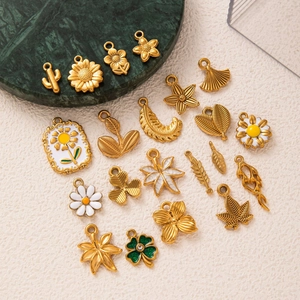 18K gold plated stainless steel ocean theme shell and botanical charms collection