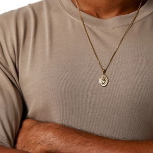 Sacred Heart hanger aan een gourmetketting van 18K verguld titanium staal voor heren