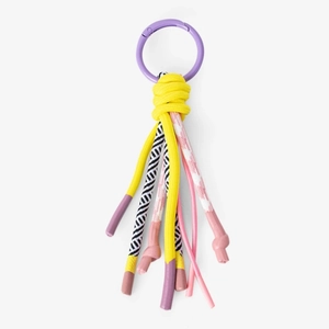 Macro shot of colorful woven rope keychain with a purple carabiner and knotted ends