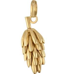 Détail macro du pendentif gâteau en acier inoxydable plaqué or 18K fini poli