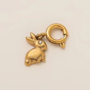 Detail of 18K gold plated bunny pendant with sparkling crystal eye and spring clasp