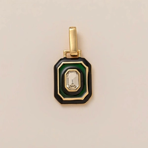 Macro shot of 18K gold-plated rectangular pendant with emerald-cut crystal and enamel inlay