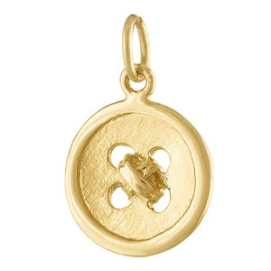 Détails d'un pendentif en forme de bouton plaqué or avec quatre trous et détails gravés