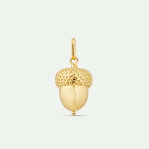 Detailed macro view of an acorn pendant with textured cap and polished gold finish