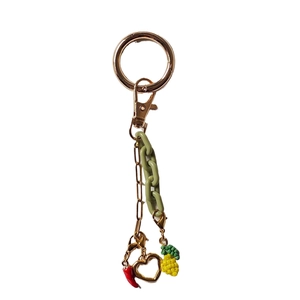 Fashion keychain with gold rings, matte green chain, red chili charm, and fruit beads
