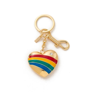 Macro view of gold heart keychain with colorful rainbow enamel and crystal accent