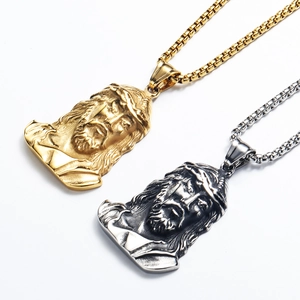 Detail of Jesus head pendant necklaces in gold and silver finish with sturdy box chain