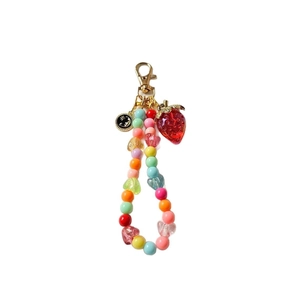 Rainbow beaded keychain with red strawberry pendant and golden lobster clasp