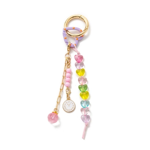 DIY gold keychain with purple heart clasp, pastel beads and mini clock dial pendant