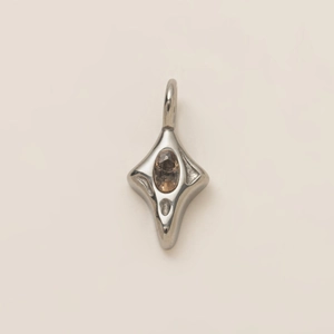Star-shaped silver pendant with champagne oval gemstone and 18K gold-plated accents