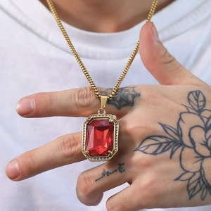 Hip hop style gold necklace with large rectangular red gemstone pendant and zircon stones