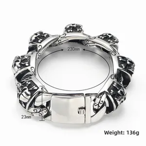 Bracciale punk da uomo con teschi in acciaio al titanio argentato e incisioni vintage