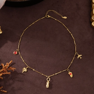 Travel themed 18K gold plated stainless steel necklace with airplane and palm tree charms