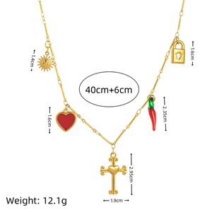 Collier en acier inoxydable plaqué or 18 carats avec breloques soleil, cœur et croix
