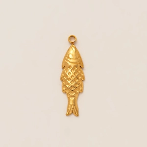 Macro shot of 18K gold plated fish pendant showing realistic scale textures and details
