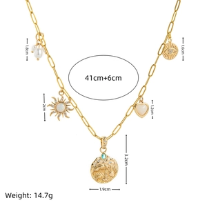 Gold paperclip link necklace with opal evil eye, pearl, and heart charms for women