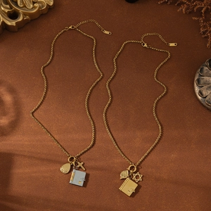 Collane vintage in acciaio inossidabile con ciondoli a croce, loto e libro oro e argento