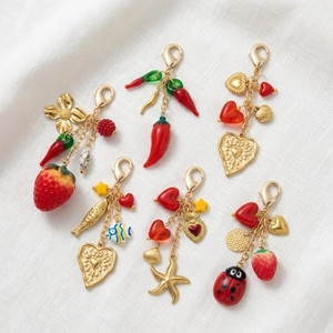 Colorful summer keychain charms set with heart, strawberry, and marine pendants