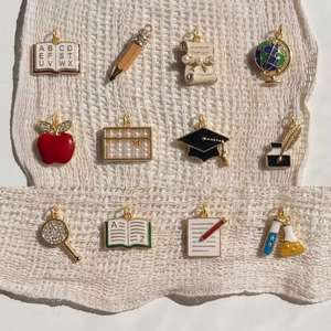 12Pcs 18K gold school theme charms featuring books pencils and globes with pearls