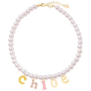 Close-up of pearl necklace with 'Chloe' colorful enamel letter pendants and golden clasp