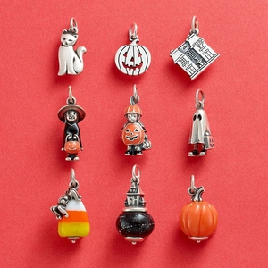 Set of 9 Halloween charms featuring pumpkin, ghost, and cat designs in colored enamel