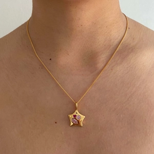 Golden star pendant necklace with heart-shaped pink zircon stones for women