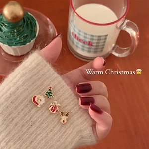 Cute Christmas stud earring set featuring Santa Claus, reindeer, tree, and gift box designs
