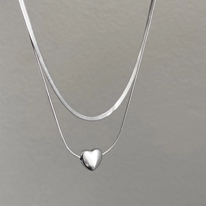 Double-layered silver titanium steel snake chain necklace with a heart pendant