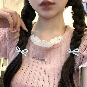 Fermagli per capelli a fiocco con strass scintillanti argento indossati da modella