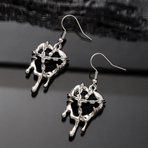 Gothic molten lava heart earrings with silver cross chains and black enamel accents