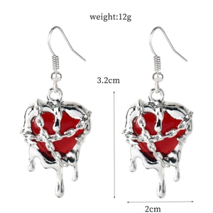 Punk style molten lava heart earrings in silver alloy with red heart and chain details