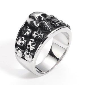Vintage stainless steel skull ring featuring 3D double-row embossed skull heads