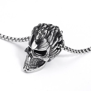 Punk style silver skull pendant necklace with box chain and spiked top design