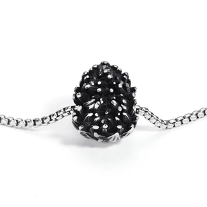 Punk style skull pendant necklace in oxidized stainless steel with vintage pinecone texture