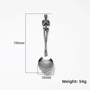 Macro detail of gothic skull handle spoon with precise dimensions 190mm and 54g weight