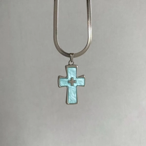 Gothic Y2K silver cross necklace with blue marble inlay on a flat snake chain
