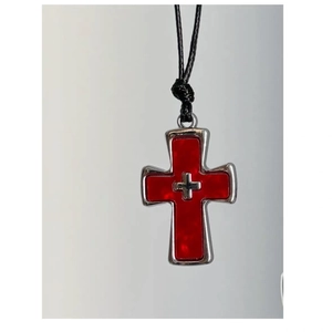 Close-up of gothic punk cross necklace with red inlay and black adjustable cord