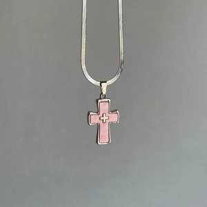 Y2K punk style silver cross necklace with pink inlay and flat snake chain pendant