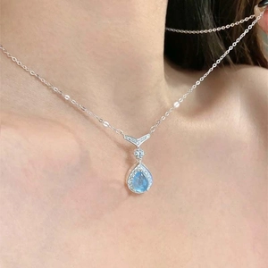 Elegant silver mermaid tear necklace with a teardrop aquamarine stone for women