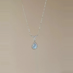 Mermaid's tear necklace with pear-cut aquamarine stone and crystal accents