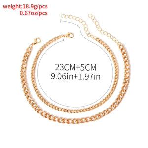 Women's gold layered chunky curb anklet set with lobster clasp and extension chain